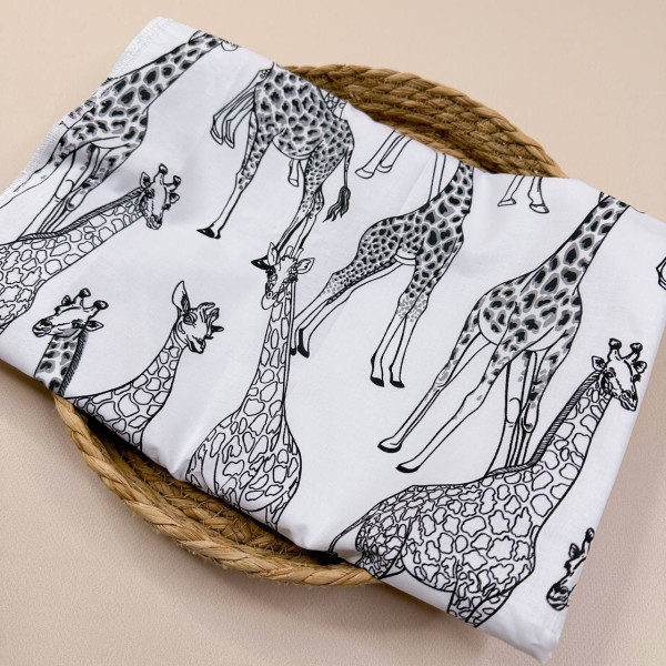 Непромокаюча пелюшка · 60×45 см · Чорні жирафи — Babywear