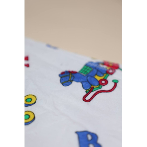 Байкова пелюшка · 70×90 см. · Абетка — Babywear